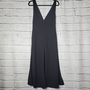 Line + Dot deep V Jumpsuit solid black size XS Kick Flare